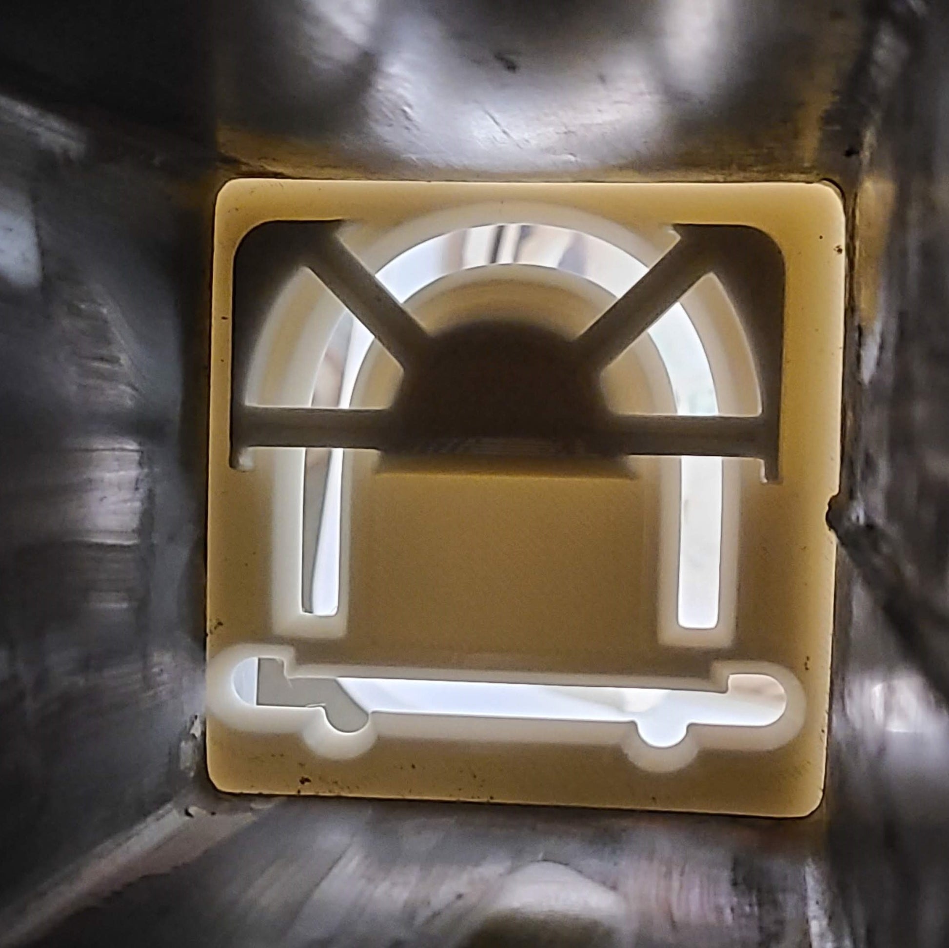 View of butter dish die from inside extruder